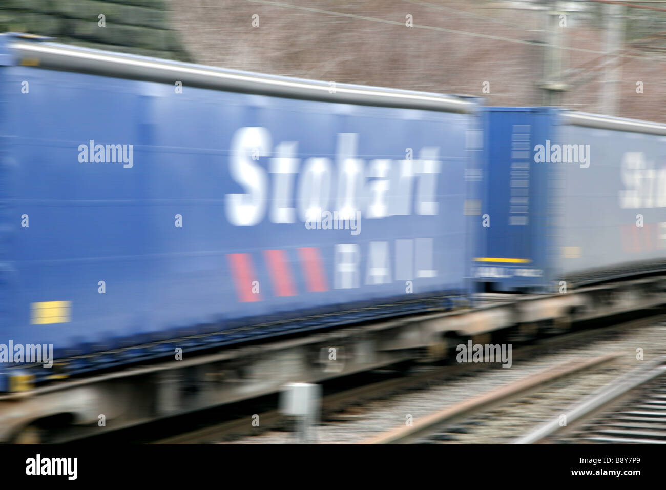 Stobart rail container train speeds south through Lancashire. Stock Photo