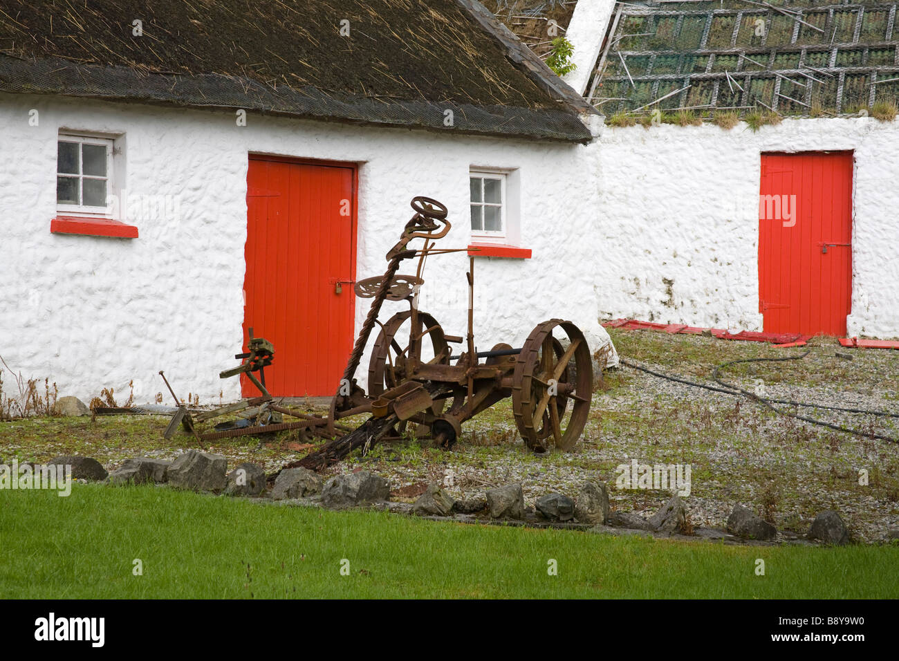 Abandoned cart in front of a cottage, Kilmacrenan, County Donegal, Ulster Province, Ireland Stock Photo