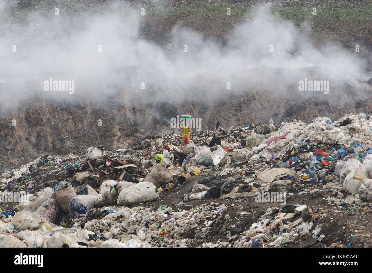 View of Olusosum dump site, where countless people try to make a living collecting rubbish for recycling. Stock Photo