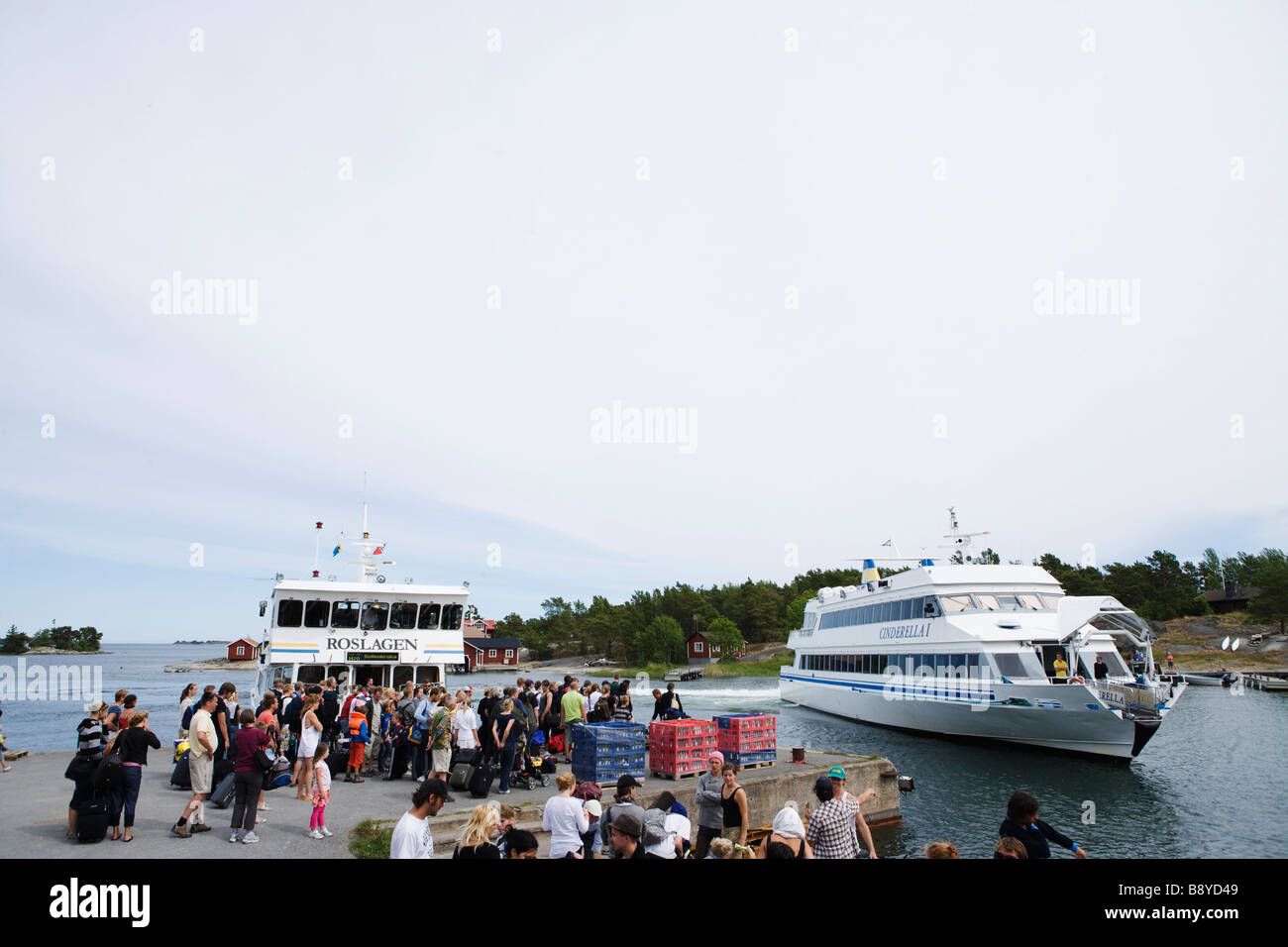People waiting for a boat in the archipelago Sweden. Stock Photo