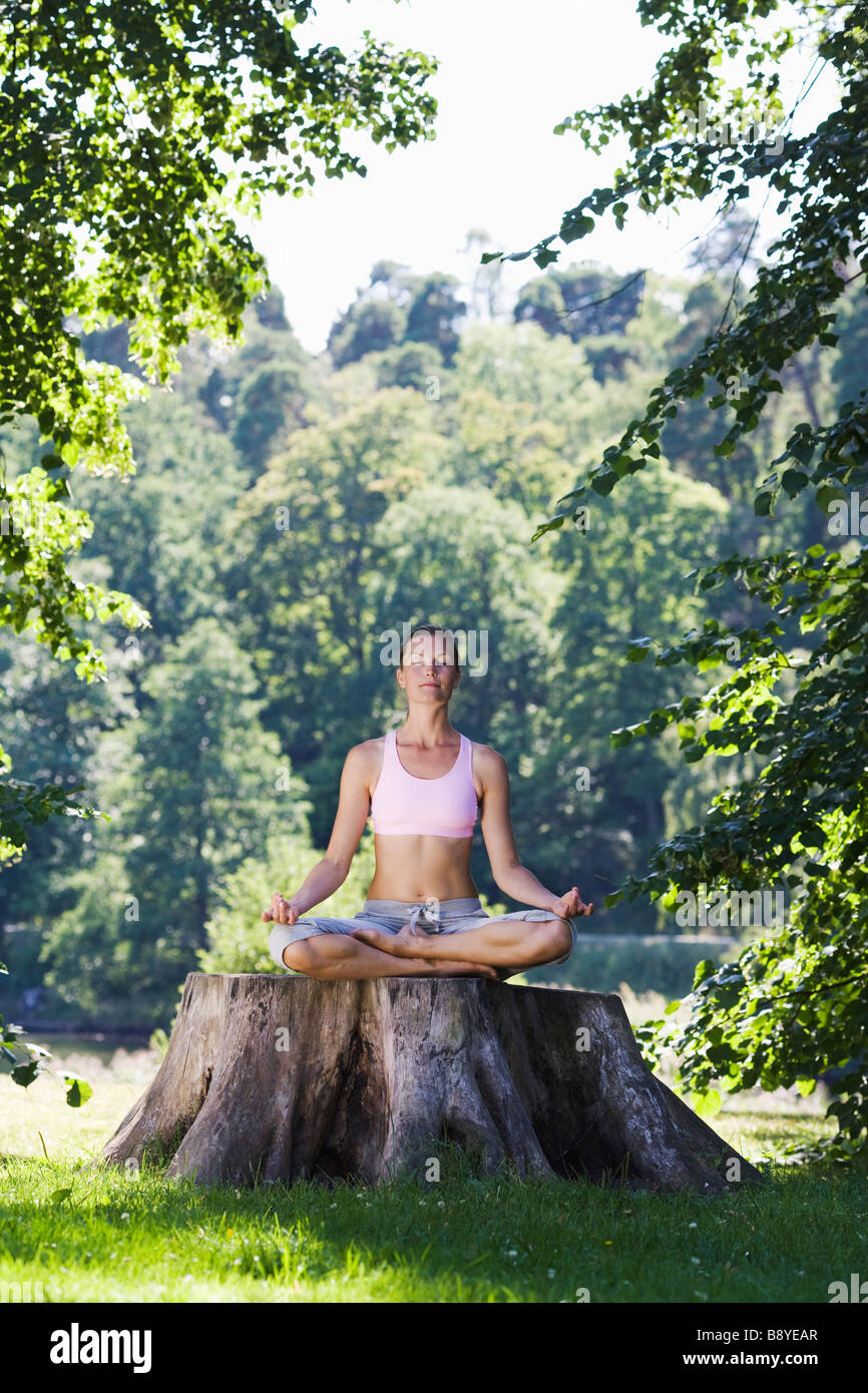 A woman practising yoga Sweden Stock Photo Alamy