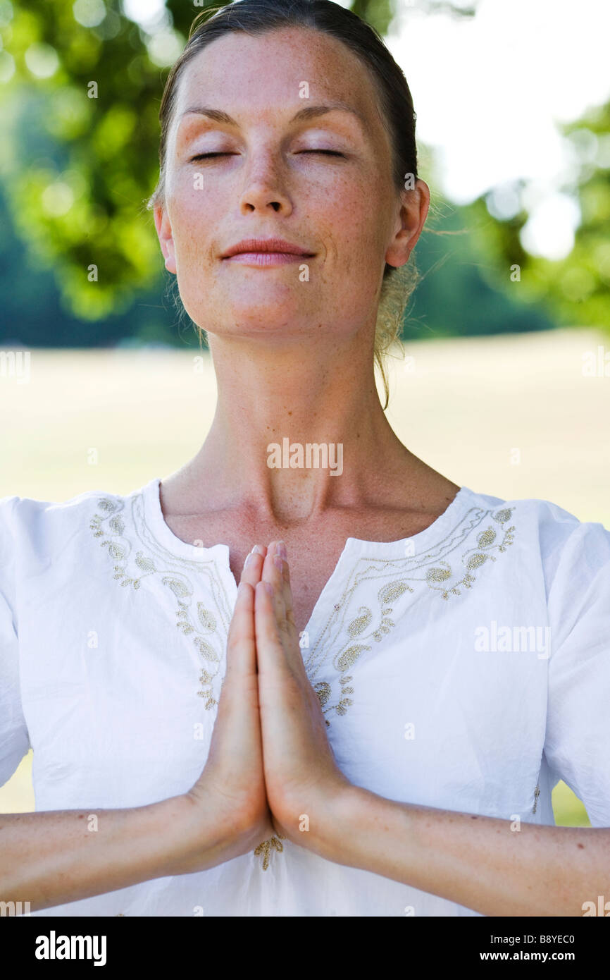 A woman practising yoga Sweden Stock Photo Alamy