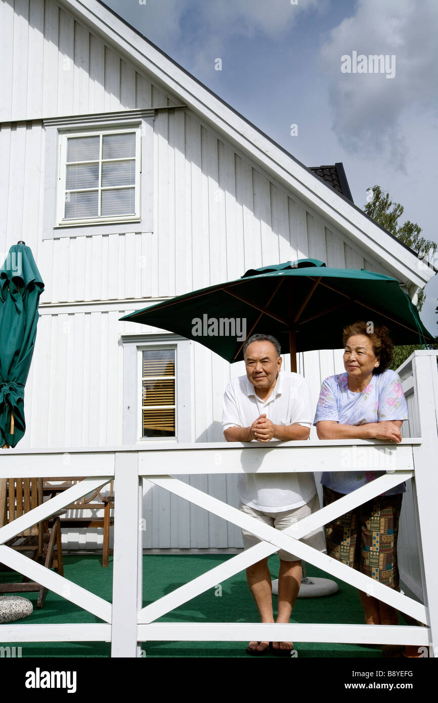 A Japanese couple in a villa Sweden. Stock Photo