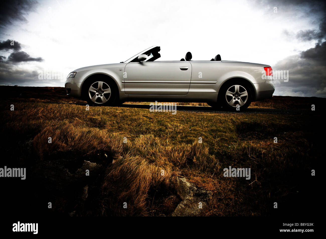 Convertible Audi A4 1.8T in silver with roof folded Stock Photo