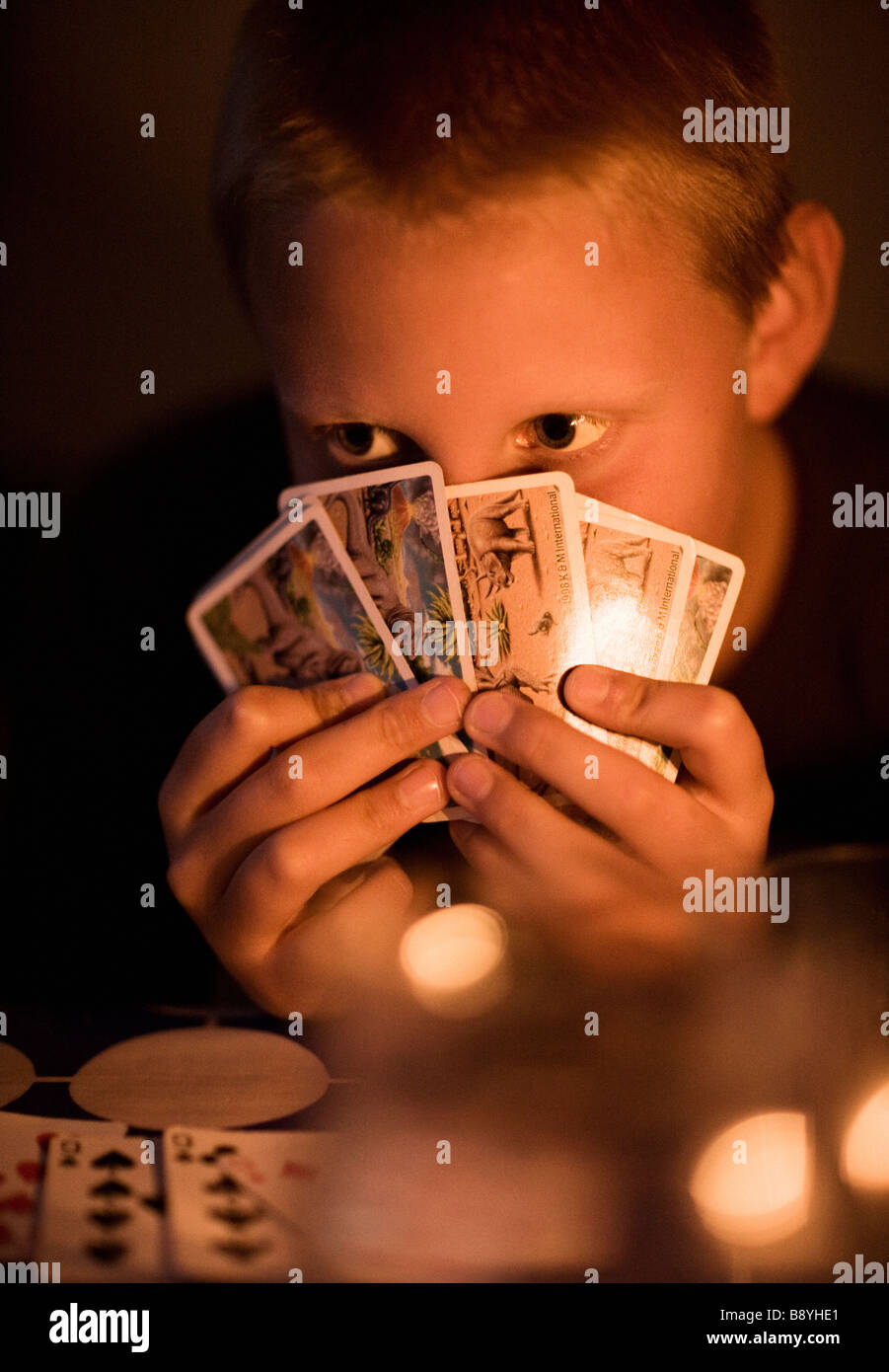 A boy playing cards Stock Photo Alamy