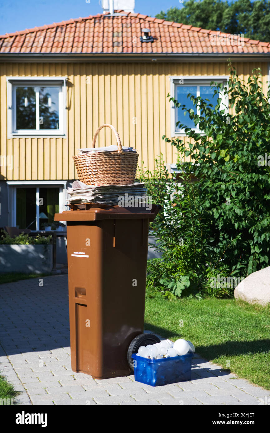 A garbage bin in a garden Stock Photo Alamy
