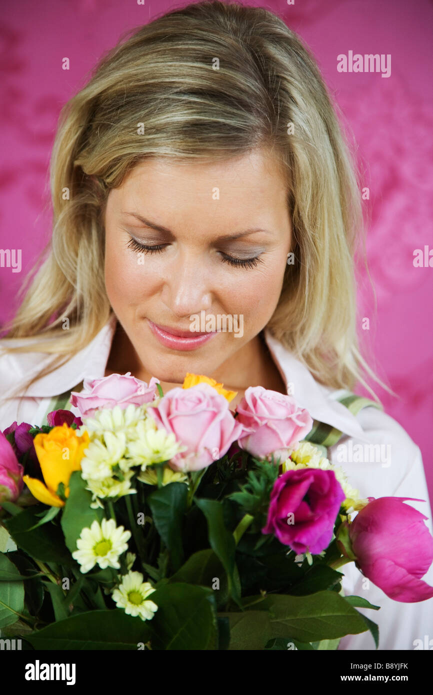 A blond woman working in a flower shop Sweden Stock Photo - Alamy