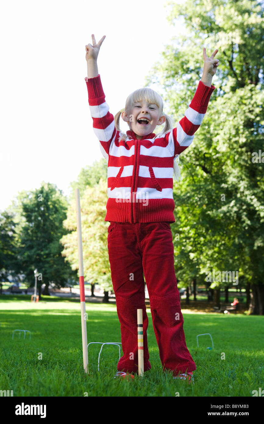 Girl playing croquet Sweden Stock Photo Alamy