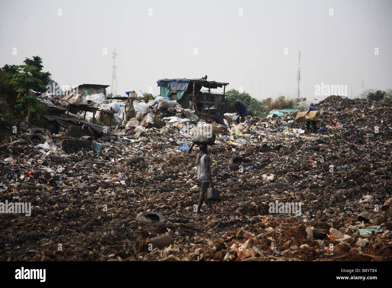 Olusosum municipal dump site where human scavengers try to make a living out of sifting through the rubbish. Stock Photo