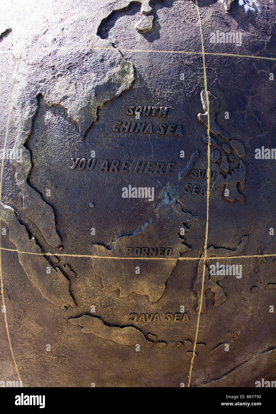 Map of Borneo stating 'You Are Here' at the Tip of Borneo Monument at Tanjung Simpang Mengayau Kudat Sabah Stock Photo