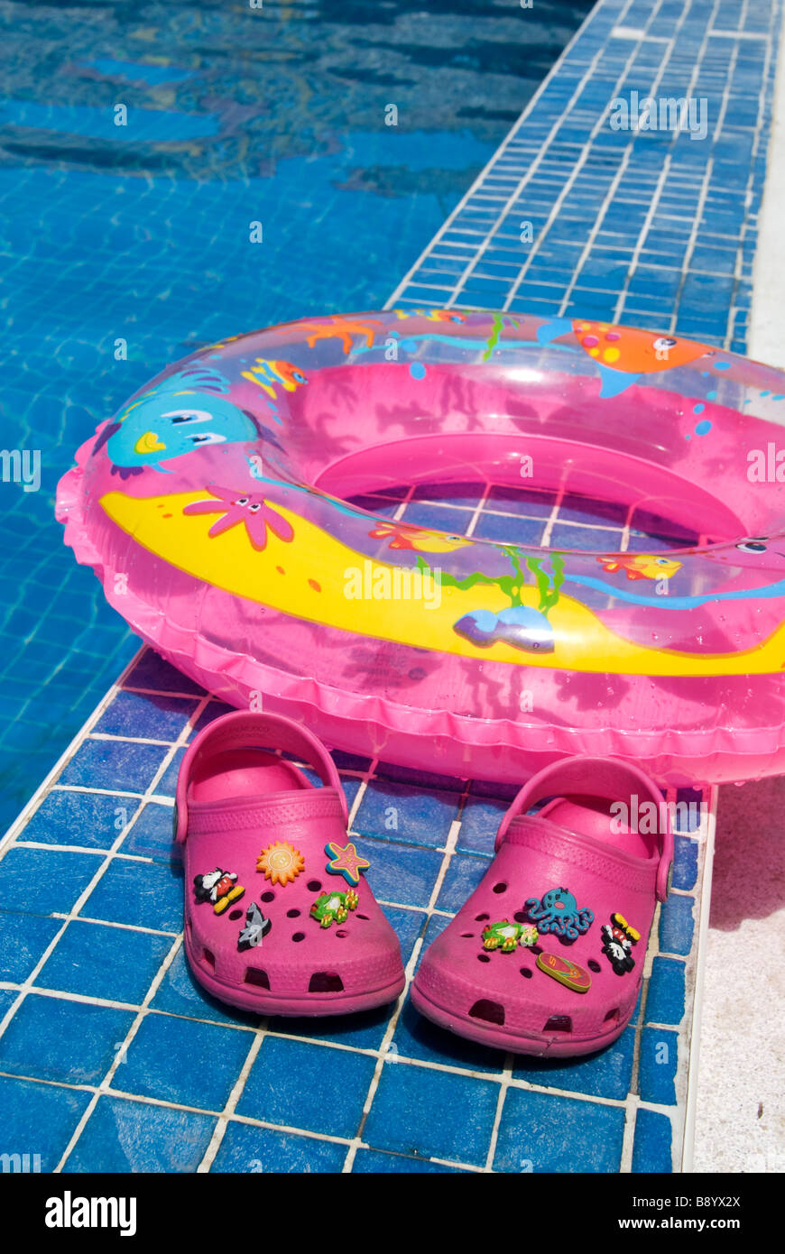 inflatable ring in swimming pool Stock Photo - Alamy