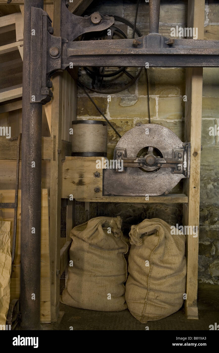 Restored machinery inside Stainsby Mill a working water powered flour mill on the Hardwick Hall