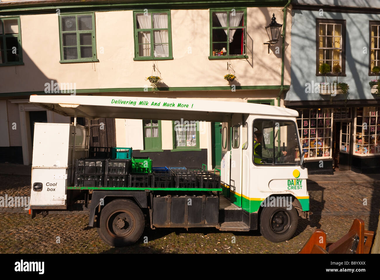A dairy crest milk float on delivery Stock Photo