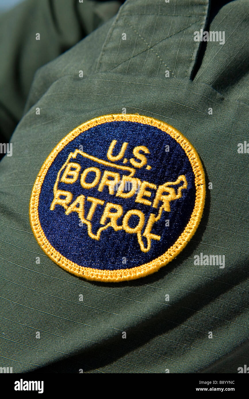 United States Border Patrol patch on an agent at the U S Mexico border along the All American Canal near Calexico California Stock Photo