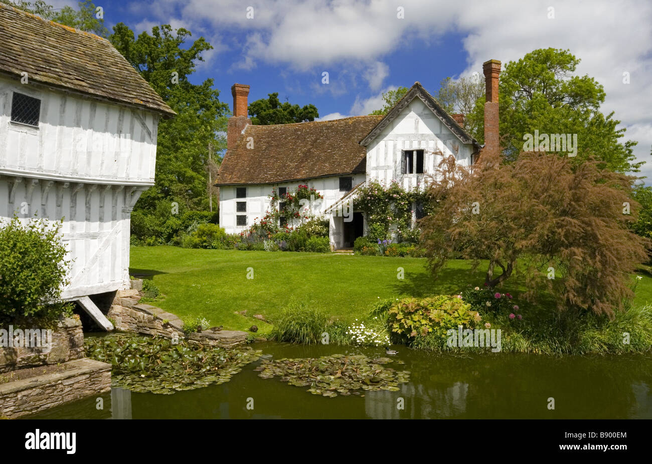 The Gatehouse with the moat and Lower Brockhampton House the medieval ...