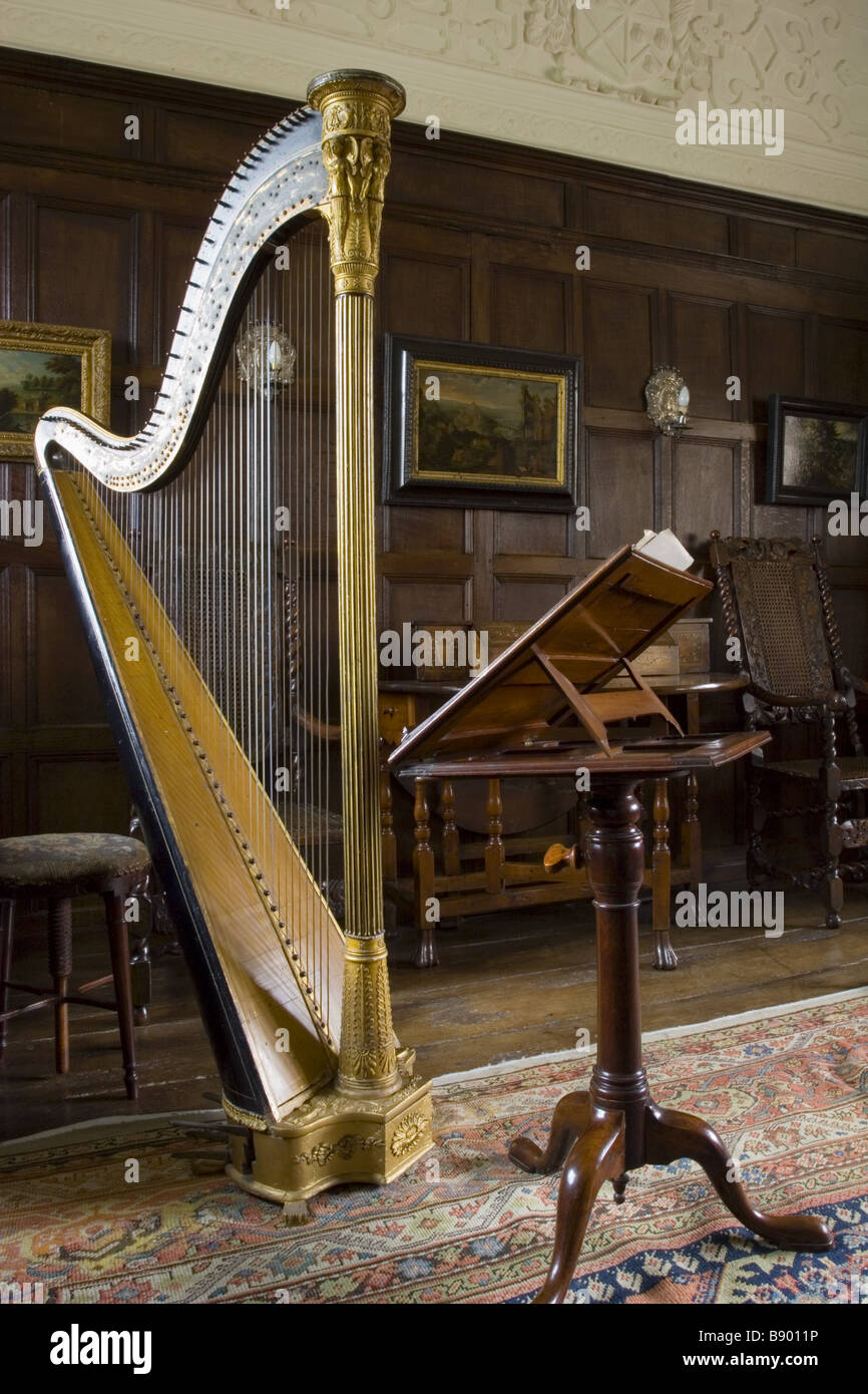 The harp and music stand in the Music Room at Westwood Manor near Bradford on Avon Wiltshire Stock Photo