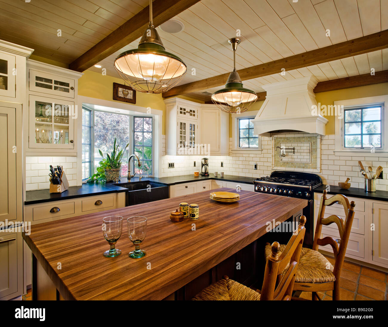 Contemporary kitchen in spanish style home Stock Photo Alamy