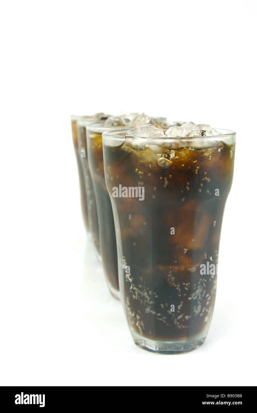 Glasses of cola isolated against a white background Stock Photo - Alamy