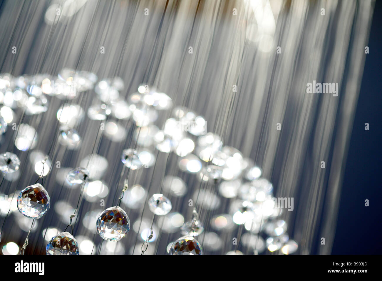 ceiling chandelier crystal glass baubles light illuminate illumination sparkle shiny glass crystal texture background tiered Stock Photo