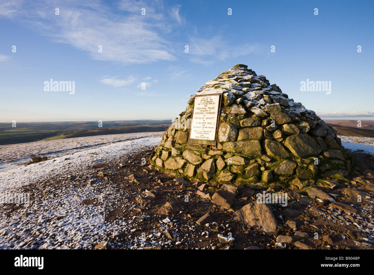 Stone Cairn at Dunkery Beacon on a snowy winter morning Exmoor National Park Somerset England Stock Photo