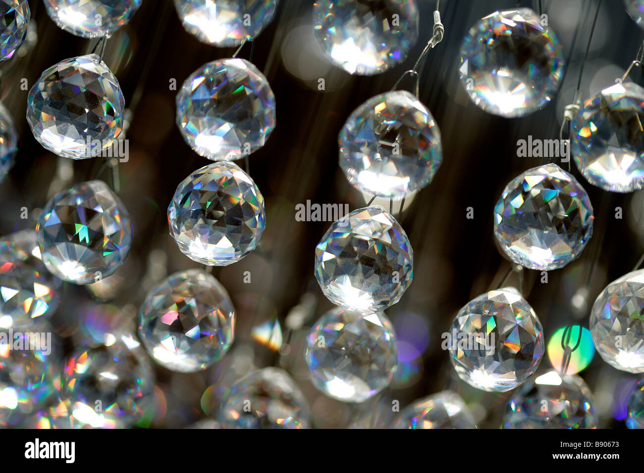 ceiling chandelier crystal glass baubles light illuminate illumination sparkle shiny glass crystal texture background tiered Stock Photo