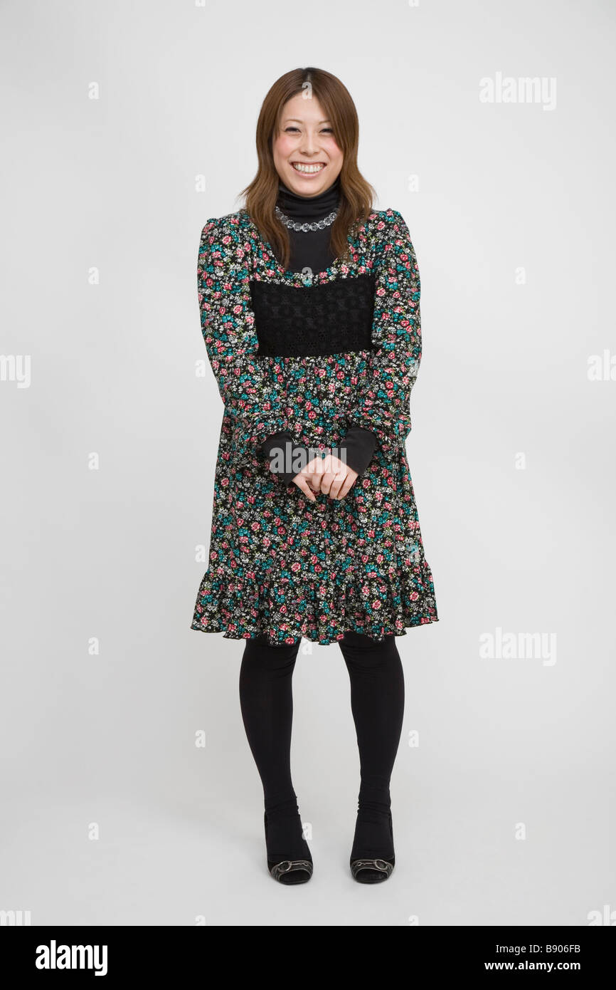 Young asian woman standing hi-res stock photography and images - Alamy