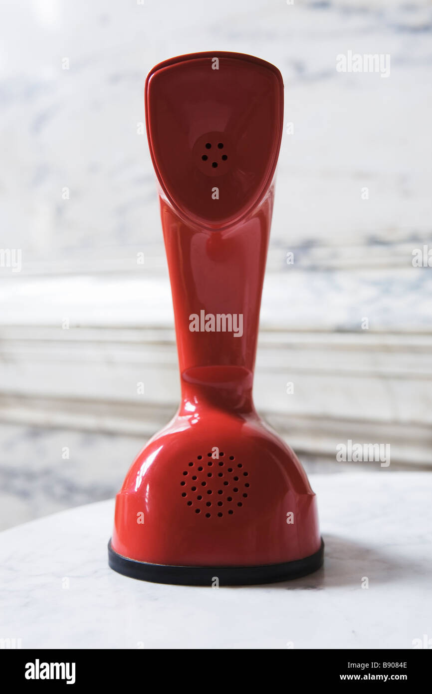A red telephone old-fashioned design Sweden. Stock Photo