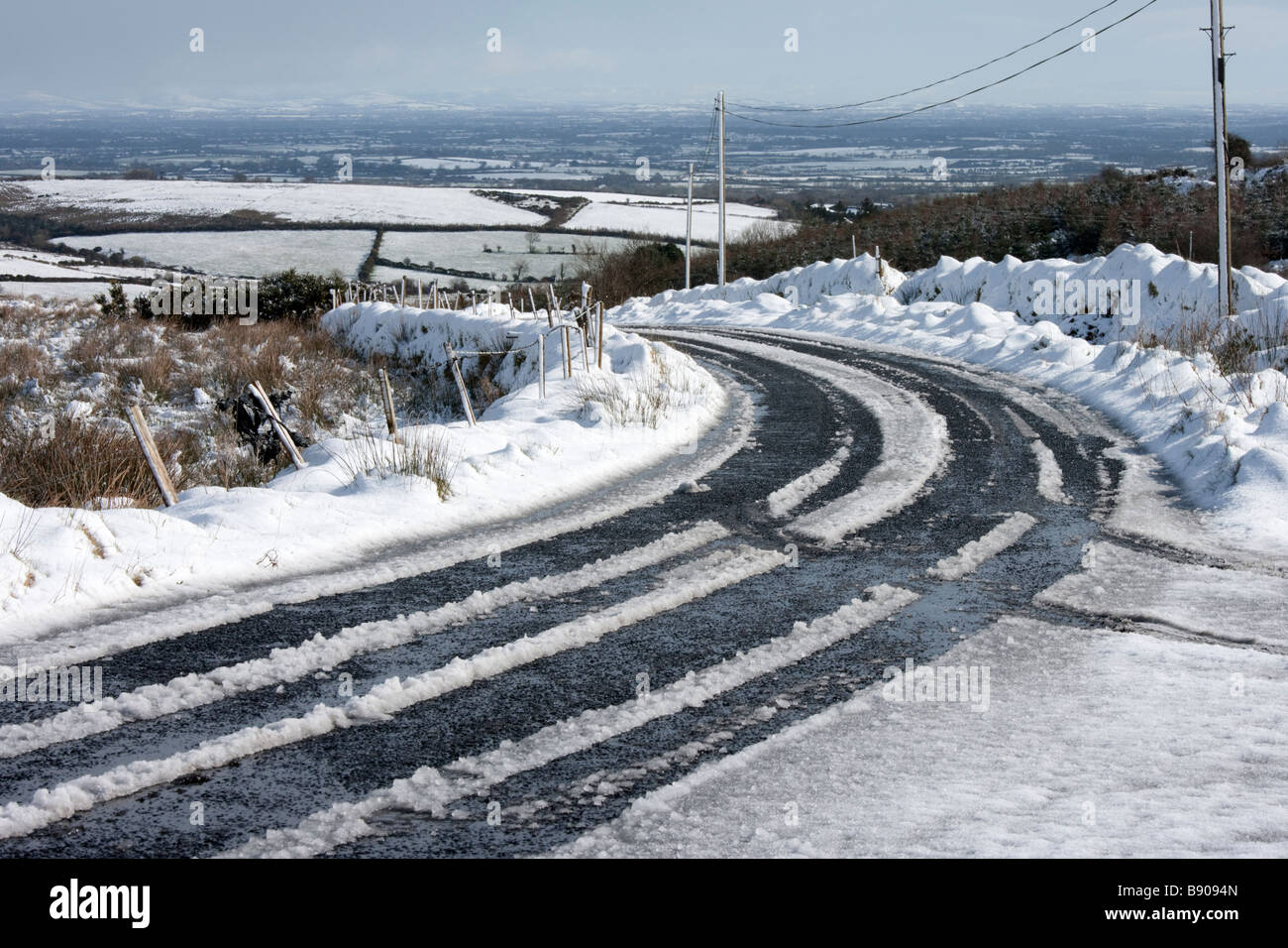 Car tracks in Snow, County Limerick Ireland Stock Photo Alamy