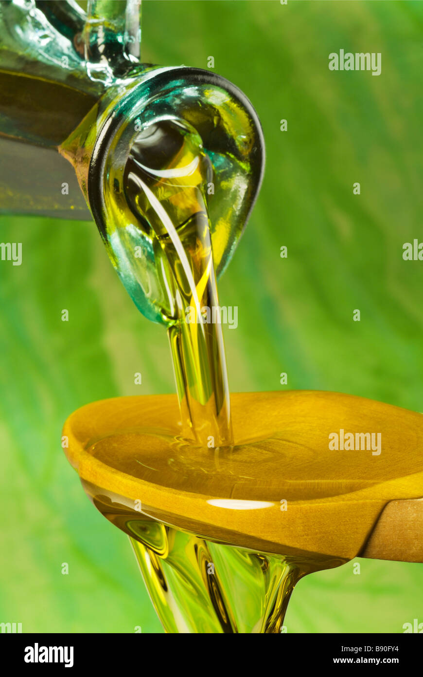 Pouring olive oil Stock Photo Alamy