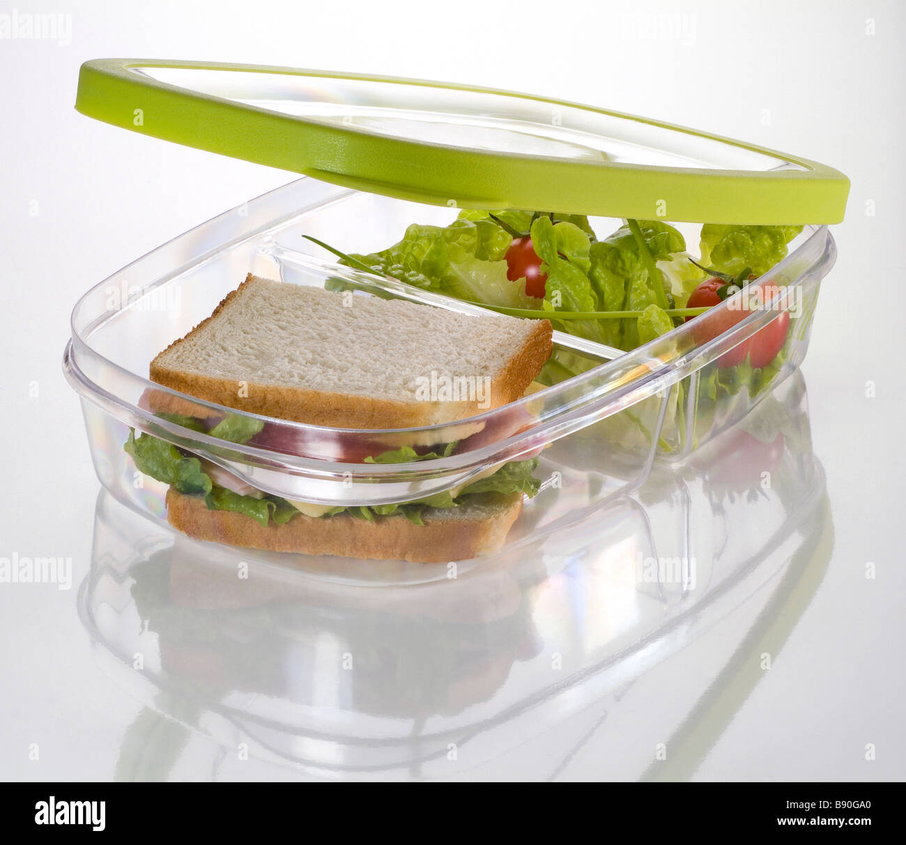 Plastic food coontainer with sandwich and salad Stock Photo