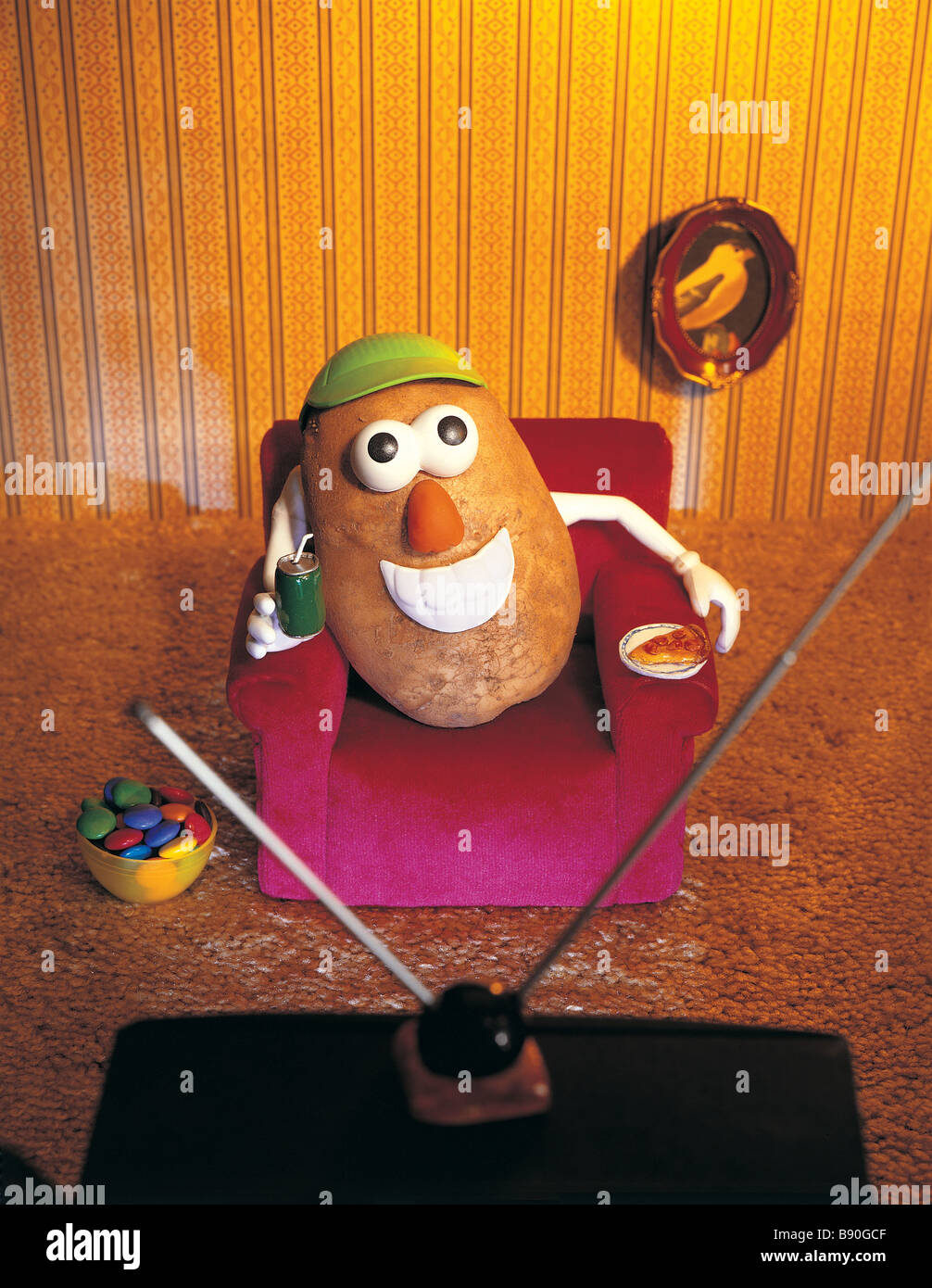 Fl2936 Nation Wong Couch Potato Watching Tv Stock Photo
