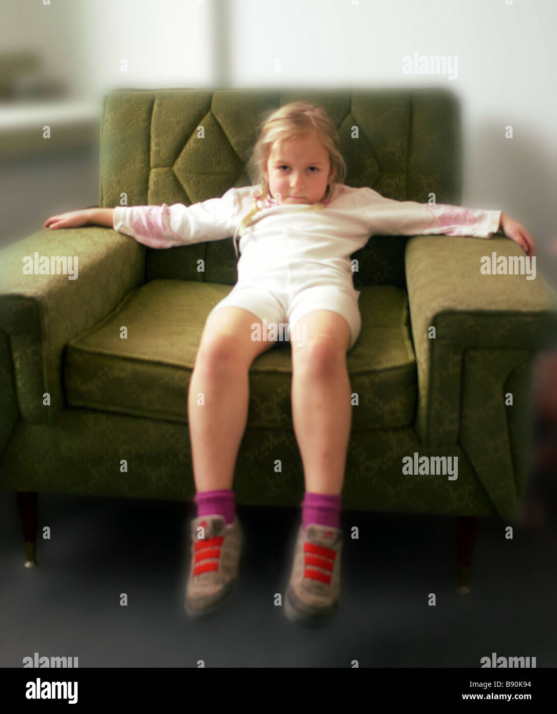 FL6090, Hot Digital Dog ; Girl Slouching Arm Chair, Waiting Impatiently Stock Photo