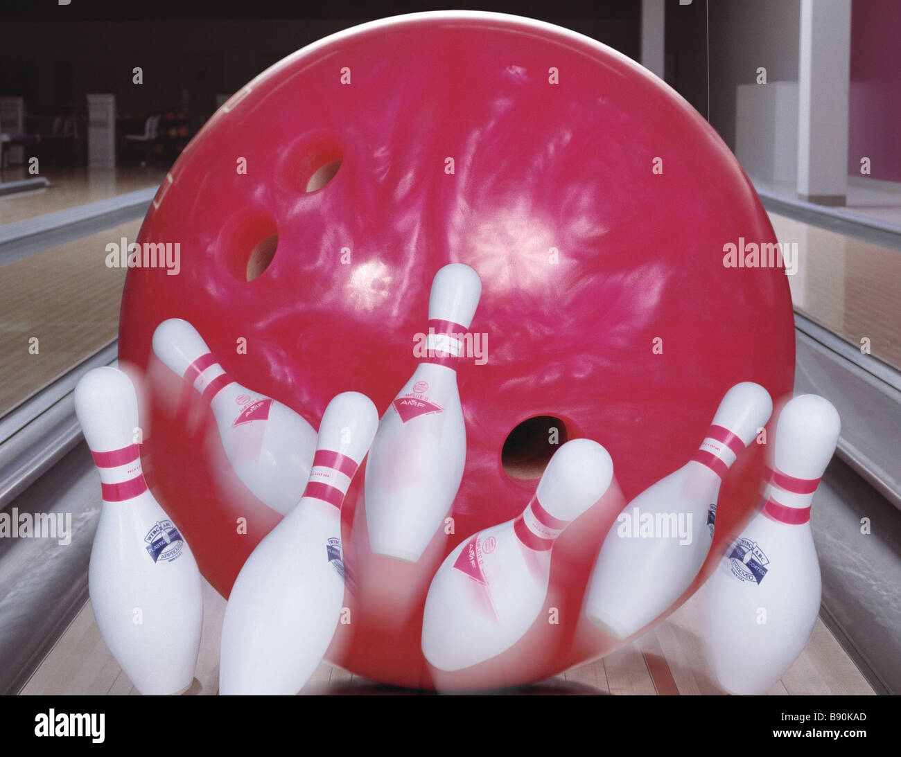 FL6436, Brian Hillier; Oversized Bowling Ball Knocking Down Pins Stock