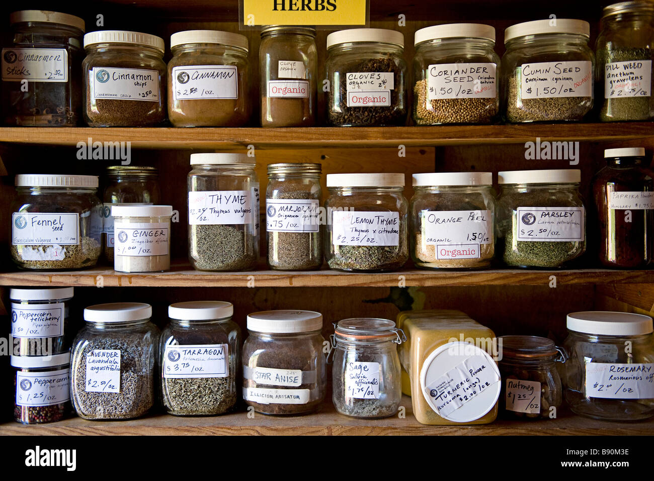 Jars containing herbs. Stock Photo