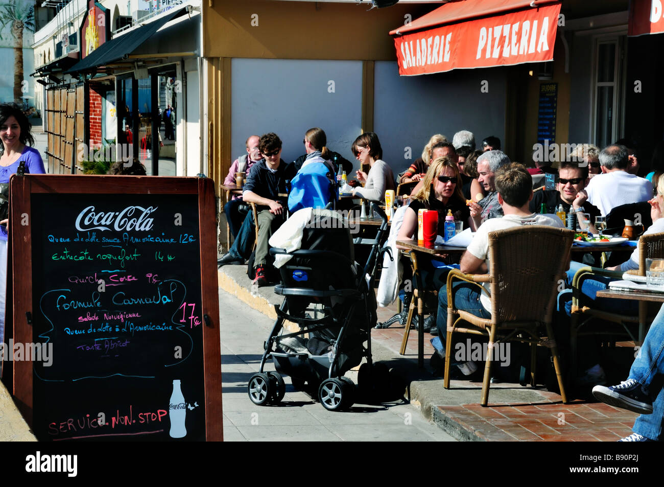 Nice France, French Family Sharing Meals outside Italian Brasserie