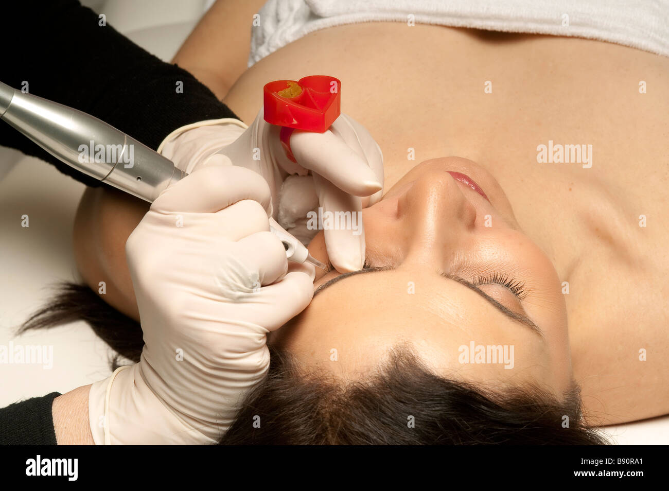 Micro-pigmentation procedure for the eyebrows permanent make up Stock Photo