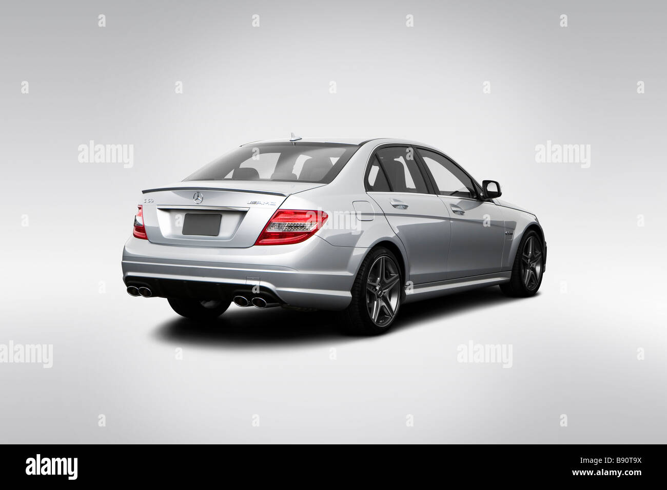 2009 Mercedes-Benz C-Class C63 AMG in Silver - Rear angle view Stock Photo