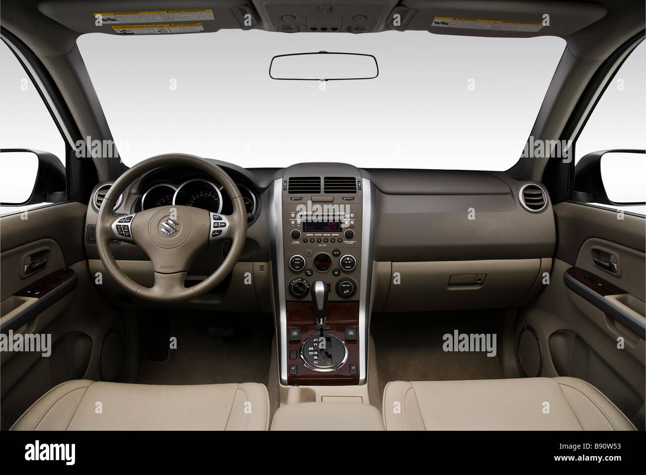 2009 Suzuki Grand Vitara in White - Dashboard, center console, gear shifter view Stock Photo