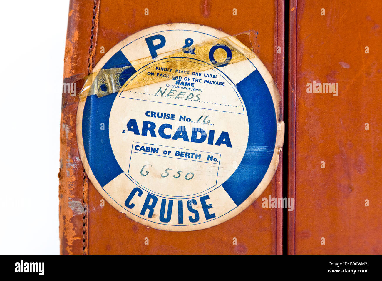 Old vintage suitcase with travel labels Stock Photo by ©PHOTOLOGY1971  53434113