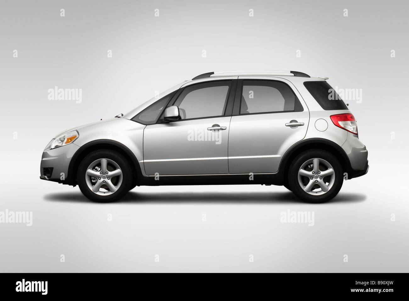 2009 Suzuki SX4 Crossover in Silver - Drivers Side Profile Stock Photo