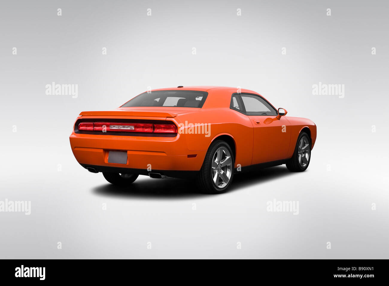 2009 Dodge Challenger R/T in Orange - Rear angle view Stock Photo