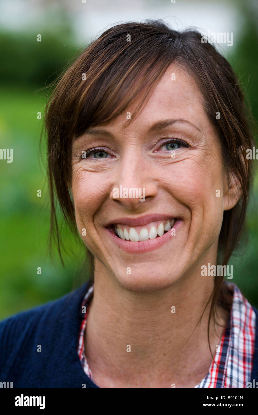 Portrait of a smiling woman Stock Photo - Alamy