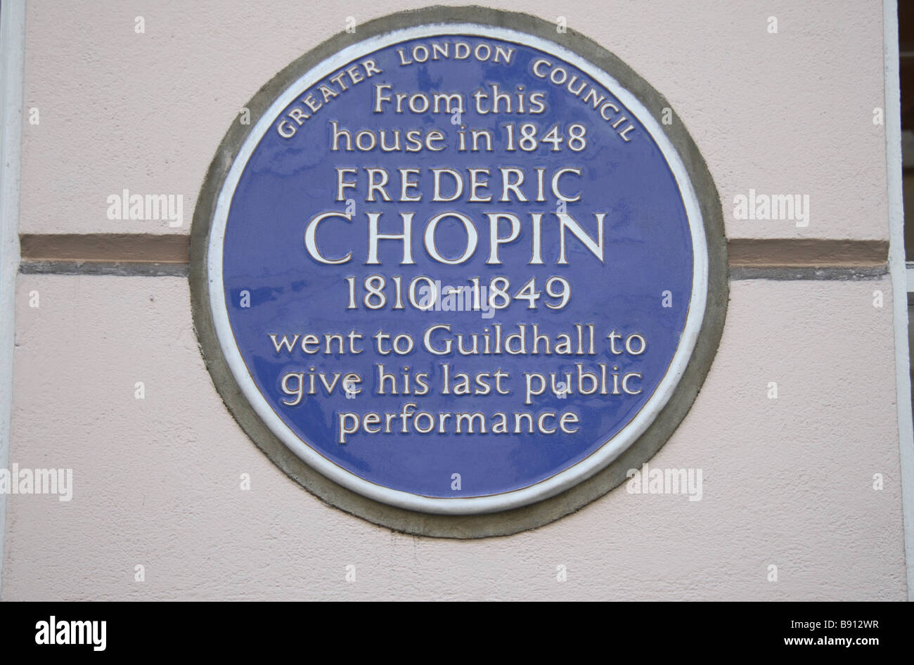 A blue plaque from where Frederic Chopin went to the Guildhall to give his last public performance.  Feb 2009 Stock Photo