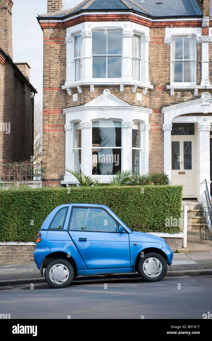 G-Wiz electric car parked in a residential street in London Stock Photo