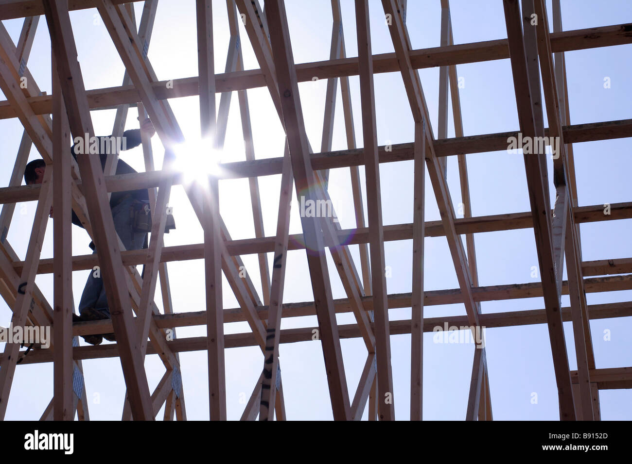 Truss rafters being set in place on new construction North America Stock Photo