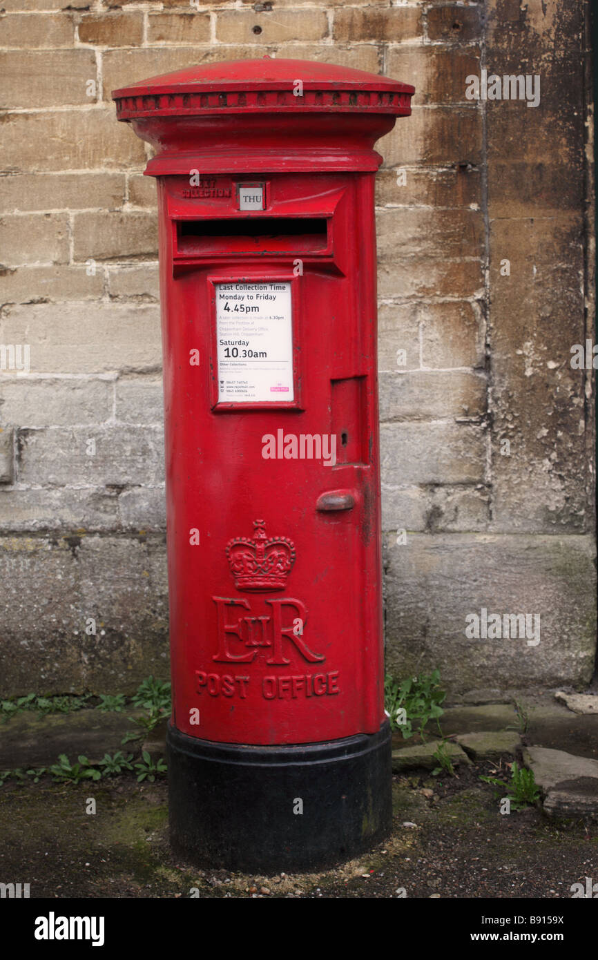 Close up of Red Pillar Box in Lacock, Wiltshire, England, UK Stock