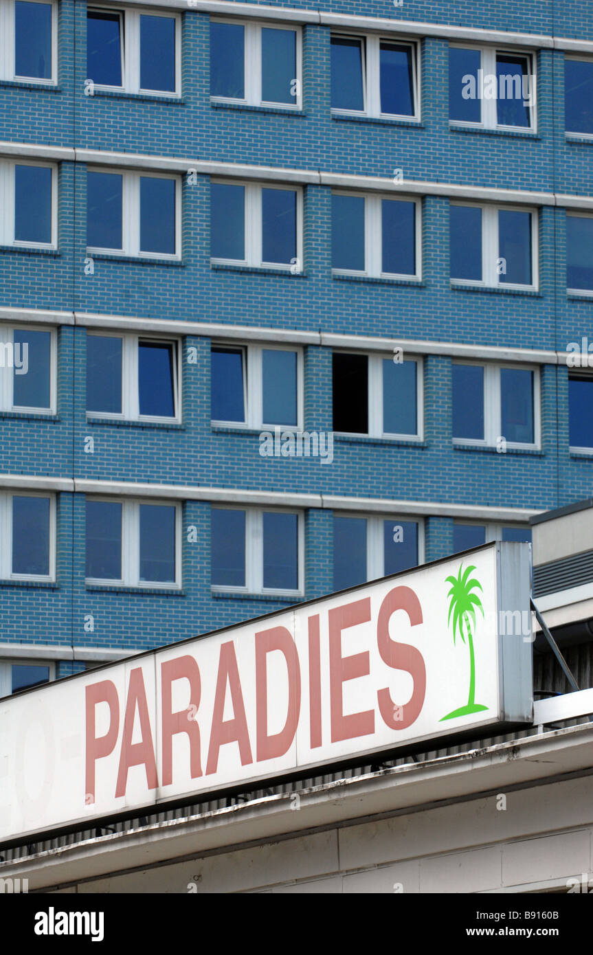 Block of flats and an inscription -Paradies-, Berlin, Germany Stock Photo