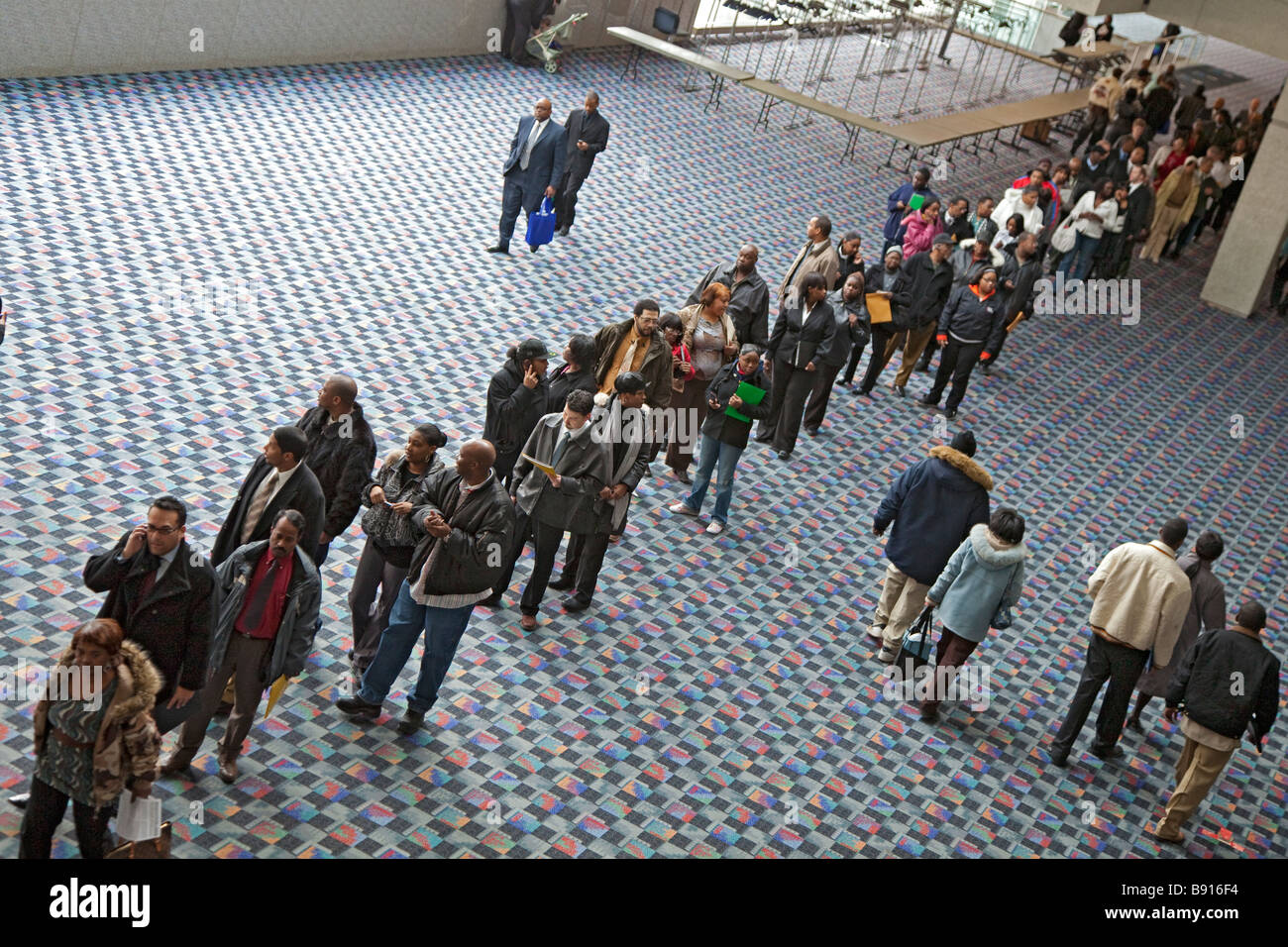 Unemployed People Look for Work at Job Fair Stock Photo