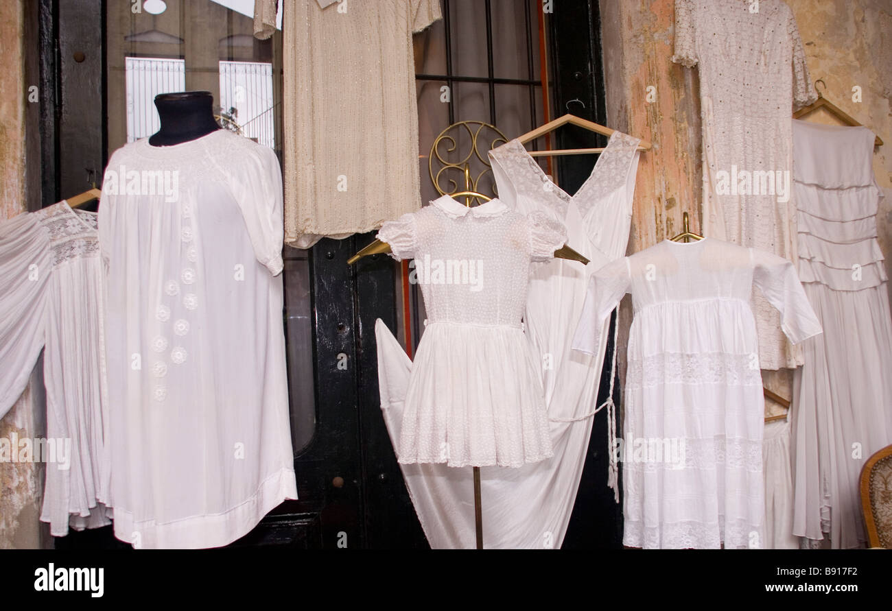 Vintage white nightgowns and underskirts laid out for sale Stock Photo Alamy