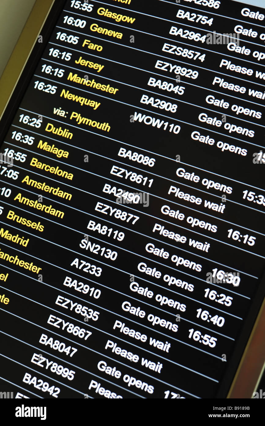 Flight information arrivals and departure board showing time destination  flight number gate status etc Stock Photo - Alamy